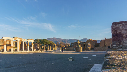 View at the ruins of the Forum during golden hour at sunset, Pompeii, Campania, Italy