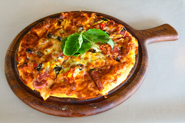 Traditional Turkish cuisine. Pizza, pita, pidesi, sucuk, hummus, kebab. Many dishes on the table. Serving dishes in restaurant. Margherita,  mix, formaggi, veggie karisik pizza. Top view, flat lay