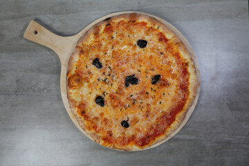 pizza on a wooden board