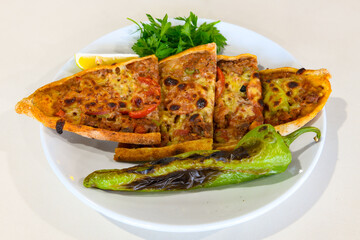 Kiymali pide. Turkish pide with minced meat. Turkish pizza mince pita Pide on white background. Etli ekmek. Kusbasi kasarli, kiymali kasarli, kiymali yumurtali, Bafra, Trabzon, Kusbasili pide.