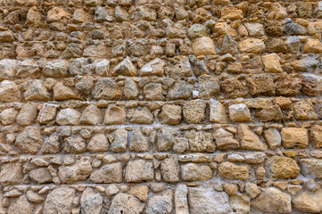 Texture of an ancient brick wall made of sandstone. Archaeological excavations 2