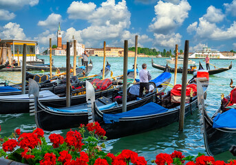 Grand canal with gandolas and San Giorgio Maggiore island, Venice, Italy. Architecture and...