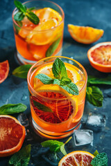refreshing summer cocktail with orange and mint