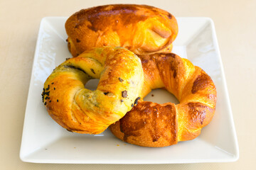 Turkish pastry product , tasty pogaca. Simit, gevrek. Turkish Pastries; peynirli, patatesli, kasarli pogaca, borek, acma, ay coregi at patisserie showcase.