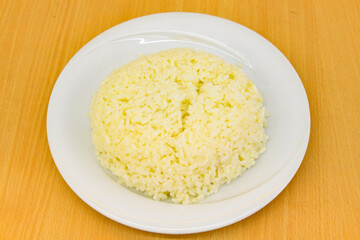 Traditional turkish bulgur pilaf with tomato sause in plate (Turkish name; bulgur pilavi, meyhane pilavi) Pirinc pilavi. Pilavustu tavuk, nohut, kuru fasulye, ciger.