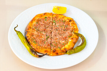 Kiymali pide. Turkish pide with minced meat. Turkish pizza mince pita Pide on white background. Etli ekmek. Kusbasi kasarli, kiymali kasarli, kiymali yumurtali, Bafra, Trabzon, Kusbasili pide.