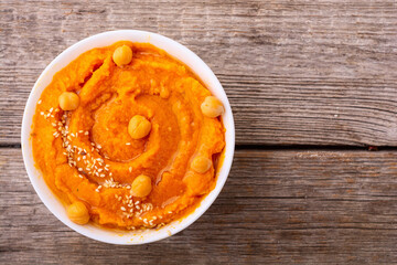 Declicious food from chickpea - pumpkin hummus . Israel and arabic kitchen