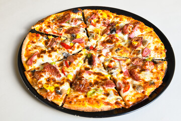 Delicious mixed pizza with rich content. Menu concept of choice and diversity. Pepperoni, Formaggi, Veggie, Karisik pizza