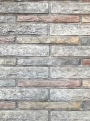 Revestimiento de piedra en un muro exterior de una casa