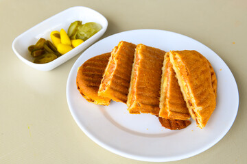 Turkish karisik atom  tost ( kasarli bazlama tost) . Sucuklu, Kasarli, kavurmali karisik tost. Flat...