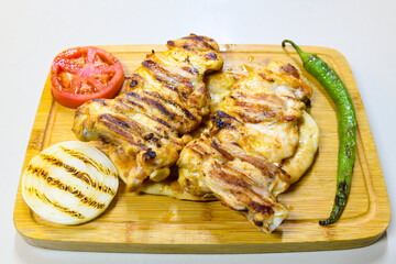 Famous Urfa meat liver, ciger wrapped by lavash with roasted chili pepper, onion and sauce in Sanliurfa, Turkey. Kuzu et ciger sis. Izgara dana bonfile, cop sis, kuzu pirzola. Karisik kebap, beyti keb