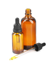 Glass bottles and pipette with tincture isolated on white