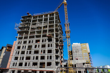 Fototapeta premium Crane operating on a construction site