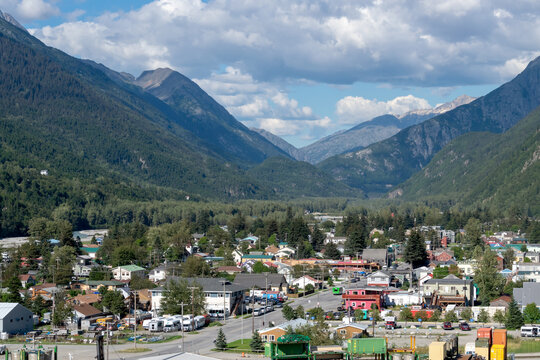 Skagway Valley, Alaska, the main maritime gateway to the Klondike Gold Rush in the Yukon region with its mountains in the background on a summer day in August.