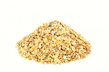 heap of rolled oats flakes for breakfast in white background