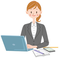 パソコンを使うスーツの女性　会社員