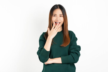 Young Asian woman exudes happiness, displaying a joyful expression as she stands against a white background.