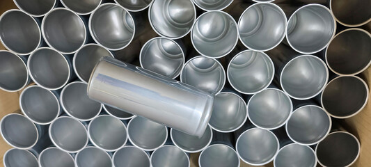 Cans prepared for entering the water production process