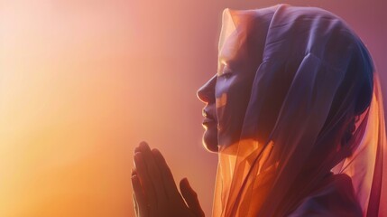An ethereal portrait of a praying woman in a headscarf, bathed in warm light.