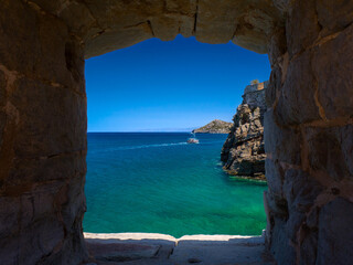 Looking over a sea from an old Venetian fortress ruin (Spinalonga Island, Crete, Greece)