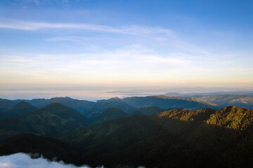 Beautiful sunlight over the mountain and misty of Thailand