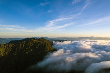 Beautiful sunlight over the mountain and misty of Thailand