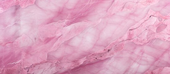 Fototapeta premium Close-up of oversized pink marble next to large slab