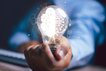 Businessman holding light bulb with ai brainstorm creative technology innovation