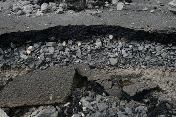 Asphalt road cross section in repair and reconstruction work. To show layer of surface and underground material. asphalt concrete, bitumen, soil, sand, rock, stone, crust, ground and earth. earthquake