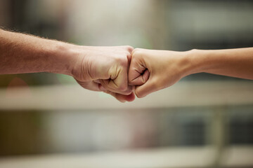 People, fist bump and hands for goals and business, support and partnership or team building....
