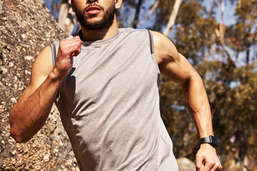 Athlete, running and action and arms for man, endurance and trail workout in nature. Fitness,...