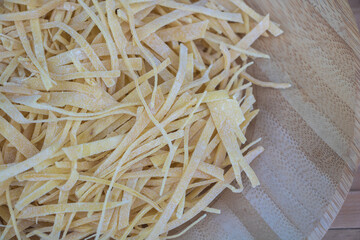 A close up of a pile of pasta noodles.