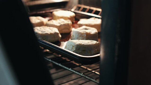 biscuits cooking in an oven 