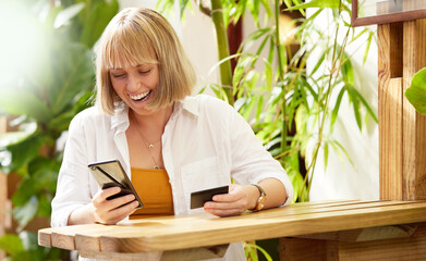 Woman, smartphone and credit card with smile, online shopping and ecommerce for retail sale....