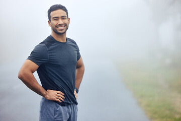Portrait, fog and man outdoor for exercise with runner in nature for cardio, health and wellness....