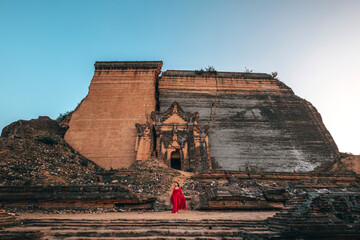 Women walks to see the ancient pagoda Mingun Pagoda in Myanmar.
