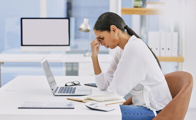 Business, woman and headache by desk with burnout in office with laptop, overworked or brain fog....