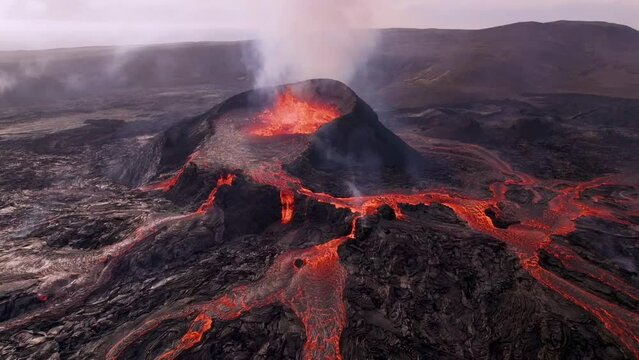Volcano Eruption at Sunset Drone Flies Dangerously Close to Magma Flowing Lava Field Hot Molten Erupting Scene Iceland.