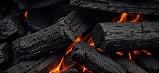 Keuken spatwand met foto Abstract charcoal background. Close-up of burned wood © StillSujith