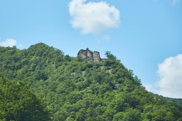 Fototapeta na wymiar The ruins of an ancient fortress near the Zhinvali reservoir in Georgia.