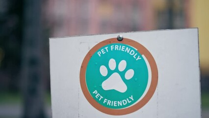 close-up of sign on the door of the establishment stating that the cafe is animal friendly