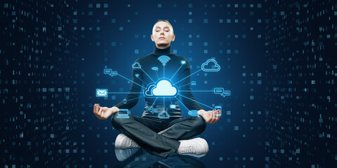 Attractive meditating young woman with creative cloud computing hologram with various icons. Cyber...