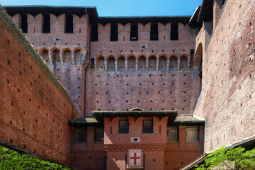 Castello Sforzesco (Sforza Castle) in Milan, Lombardy, Italy. Walls and towers close-up. View, details, architectures and embellishments..