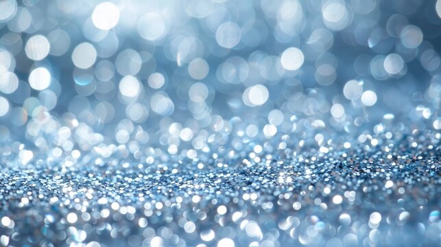 sparking light blue colour glitter with blurred bokeh effect
