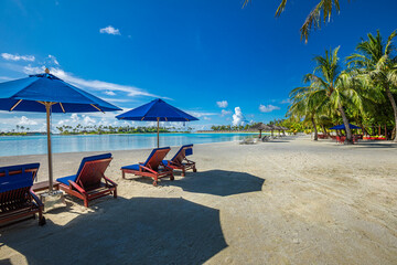 Amazing tranquil relax chairs umbrella tourism carefree. Maldives island beach. Tropical landscape...