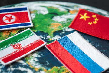 Symbols of Russia, China, North Korea and Iran against the background of the world, the concept of...