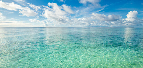 Crystal clear seascape. Perfect sunshine sky water of ocean. Blue sea transparent ocean water...