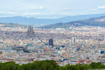 Fototapeta na wymiar Barcelona, Spain: aerial view from Montjuic to the city of Barcelona with Sagrada Familia