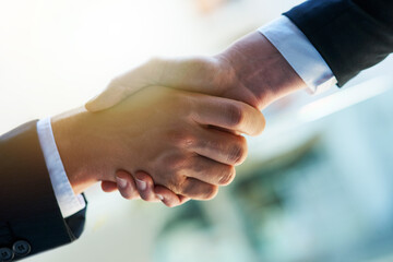 Business people, handshake and partnership with b2b for meeting, collaboration or greeting at...