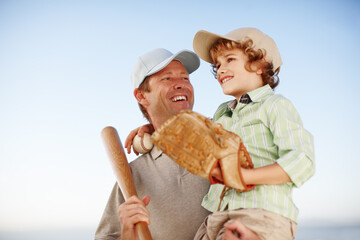 Father, boy and happy for baseball, outdoor and game with hug for love, bonding and teaching....